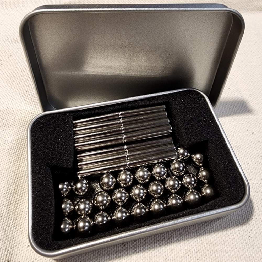 Magnetic rods with balls